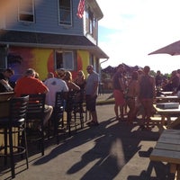 Photo taken at Sunset Harbor Bar &amp;amp; Grille by Martin H. on 7/29/2012