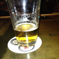 Photo taken at One Mile West Restaurant and Tavern by J B. on 4/4/2012