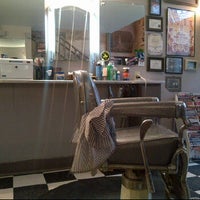Photo taken at Big Kat&#39;s Tattoo and Barber Shop by Robin W. on 7/17/2012