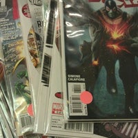 Photo taken at Cosmic Comics! by Natalie M. on 1/19/2012