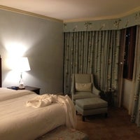 Photo taken at Windsor Court Hotel by Kate V. on 8/14/2012