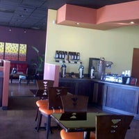 Photo taken at Oasis Coffee Spot by James G. on 10/22/2011