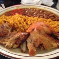 Photo taken at Rincon Criollo Restaurant by Tina A. on 11/12/2011