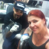 Photo taken at Markone Tattoo by Bel C. on 1/14/2012
