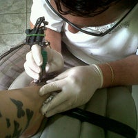 Photo taken at Marcelo Calle Tattoo by Ana Luiza V. on 1/11/2012