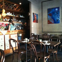 Photo taken at Mundo Café &amp;amp; Restaurant by Kerry C. on 7/14/2012