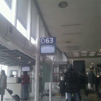 Photo taken at Gate D63 by Matthieu C. on 11/17/2011