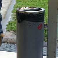 Photo taken at Lot 1 Smoking Area  by Kenny B. on 4/22/2011