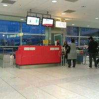 Photo taken at Gate C16 by Bodi A. on 1/27/2012