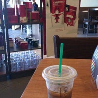 Photo taken at Starbucks by Gracie T. on 12/16/2011