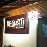 Photo taken at Degusti Bar &amp; Restaurante by Luciana M. on 6/12/2012