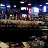Photo taken at Bully&amp;#39;s Sports Bar &amp;amp; Grill by Sam M. on 1/25/2012