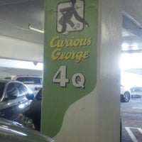 Photo taken at Curious George Parking by Yoshiko E. on 8/7/2012