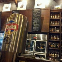 Photo taken at 1ª Cervejaria da Mooca by Daniel A. on 7/24/2012