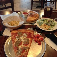 Photo taken at Russo&amp;#39;s New York Pizzeria by Roberto M. on 3/29/2012