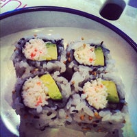 Photo taken at Yo! Sushi by Chanda H. on 7/23/2012