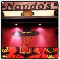 Photo taken at Nando&amp;#39;s by Zamir U. on 8/5/2012