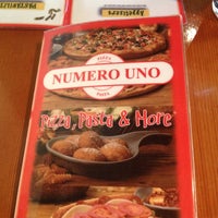 Photo taken at Numero Uno Pizza by Meghan J. on 6/19/2012