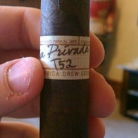 Photo taken at Crossroads Cigars by Nick C. on 5/20/2012