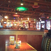 Photo taken at Red Robin Gourmet Burgers and Brews by Lui A. on 3/20/2012