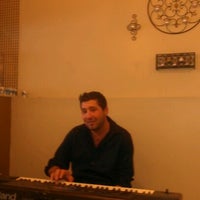 Photo taken at Melody Cafe by Vanessa A. on 4/21/2012