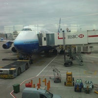 Photo taken at Gate 32 by Alexandra &amp;. on 7/17/2011