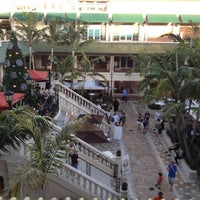 Photo taken at CocoWalk Shopping Center by Orita I. on 11/27/2011