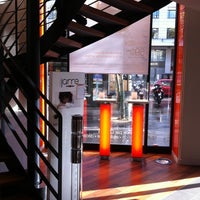 Photo taken at Boutique Orange by Alexandre D. on 10/7/2011