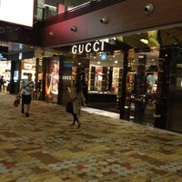 Photo taken at Gucci by Kenneth K. on 7/16/2012