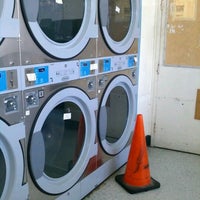 Photo taken at Western 24 Coin Laundry by Julio F. on 10/9/2011