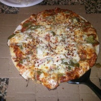 Photo taken at Damenzo&amp;#39;s Pizza by Cynthia D. on 7/22/2011