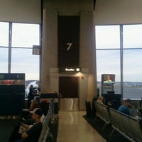 Photo taken at Gate A7 by Mihail F. on 9/17/2011