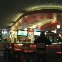 Photo taken at Applebee&amp;#39;s Grill + Bar by Gaby Q. on 12/21/2011