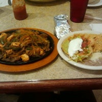 Photo taken at Los Arcos Mexican Restaurant by Brittany J. on 1/21/2012