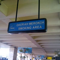 Photo taken at smoking area arrival E/D by deddy R. on 2/2/2012