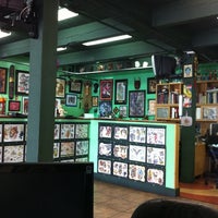 Photo taken at Rock-A-Billy Tattoo &amp;amp; Piercing Studio by Kimberly J. on 2/19/2011