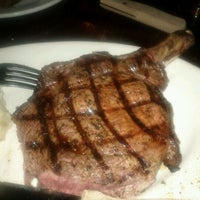 Photo taken at Carvers Steaks &amp;amp; Chops by Phillip M. on 12/8/2011