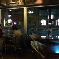 Photo taken at A Café by X on 2/20/2012