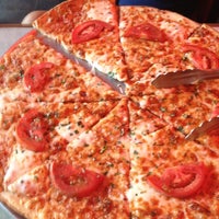 Foto tomada en Wicked Pizza  por Leo G. el 4/24/2012