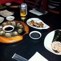 Photo taken at Taw Sushi Bar by Viviane D. on 10/15/2011