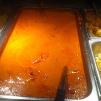 Photo taken at Gopuram Taste of India by Abby M. on 9/23/2011