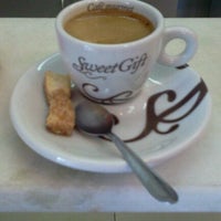 Photo taken at Sweet Gift Café by Thiago G. on 11/12/2011