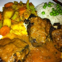 Photo taken at Taj Mahal Indian Cuisine by Erik E. on 7/19/2012
