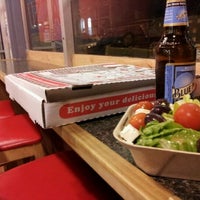 Photo taken at Galaxcy Pizza by Amber on 4/12/2012