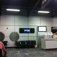Photo taken at Gate E33 by Jamie on 6/18/2012