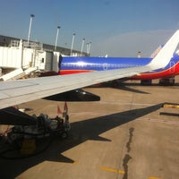 Photo taken at Gate E14 by Justin M. on 3/26/2012