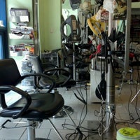 Photo taken at Tops Cut Salon by Danny C. on 7/17/2012