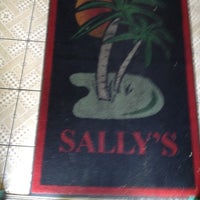 Photo taken at Sally&amp;#39;s West Indian Restaurant by Ty K. on 4/17/2012