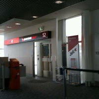 Photo taken at Gate 52 by Gregor W. on 3/28/2012
