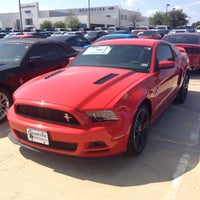 Photo taken at Grapevine Ford Lincoln by Kevin C. on 7/4/2012